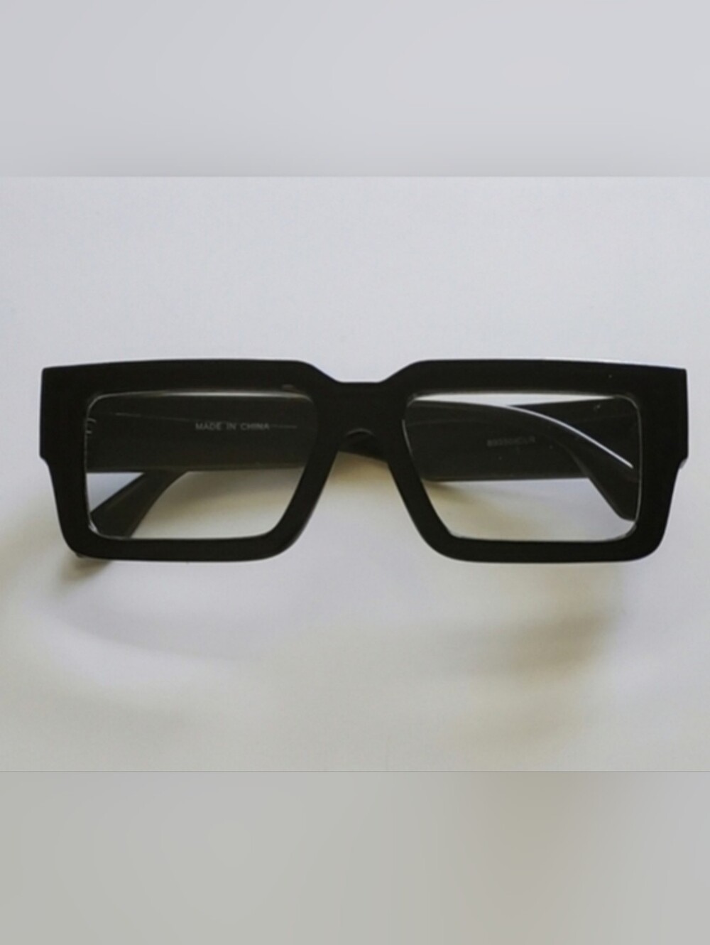 Black Glasses with Gold Accents